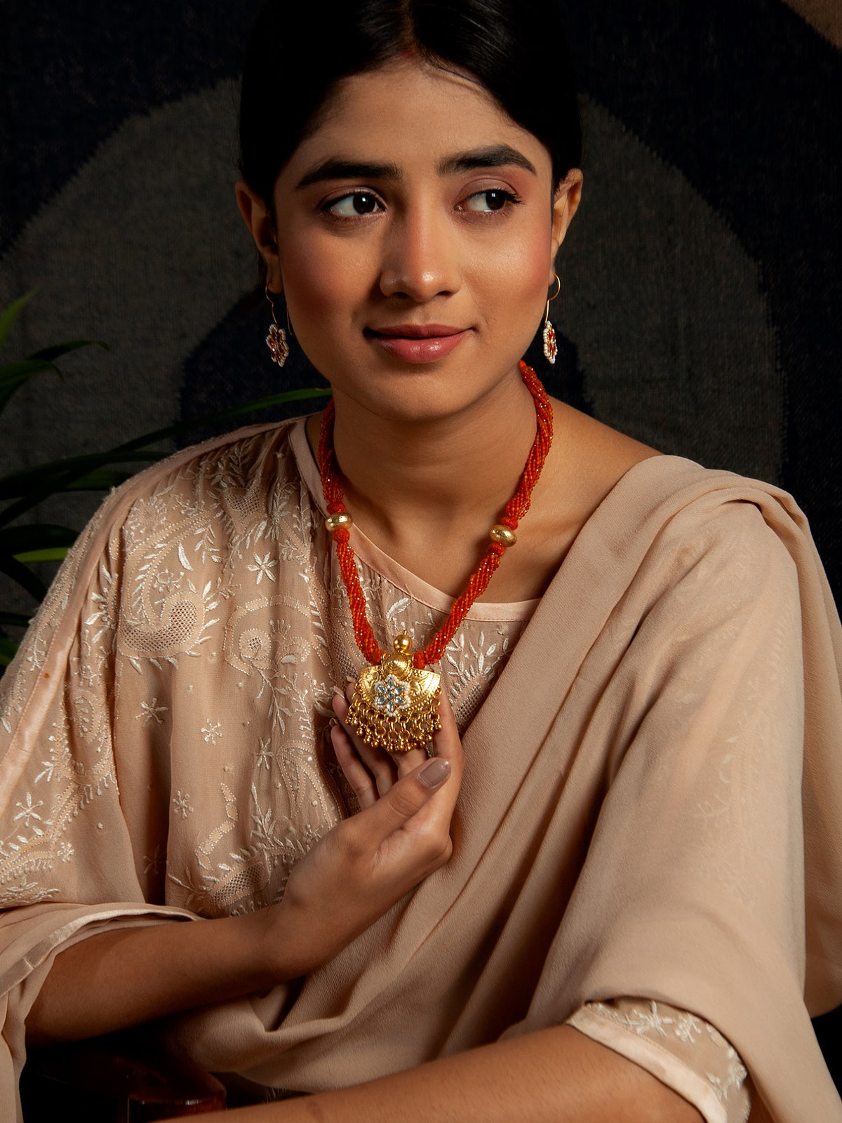 Golden Ghungroo Fusion: 925 Silver Gold Plated Pendant with Tribal Ghungroo, Floral Kundan Motif, and Orange Carnelian Gemstone Beads view 4