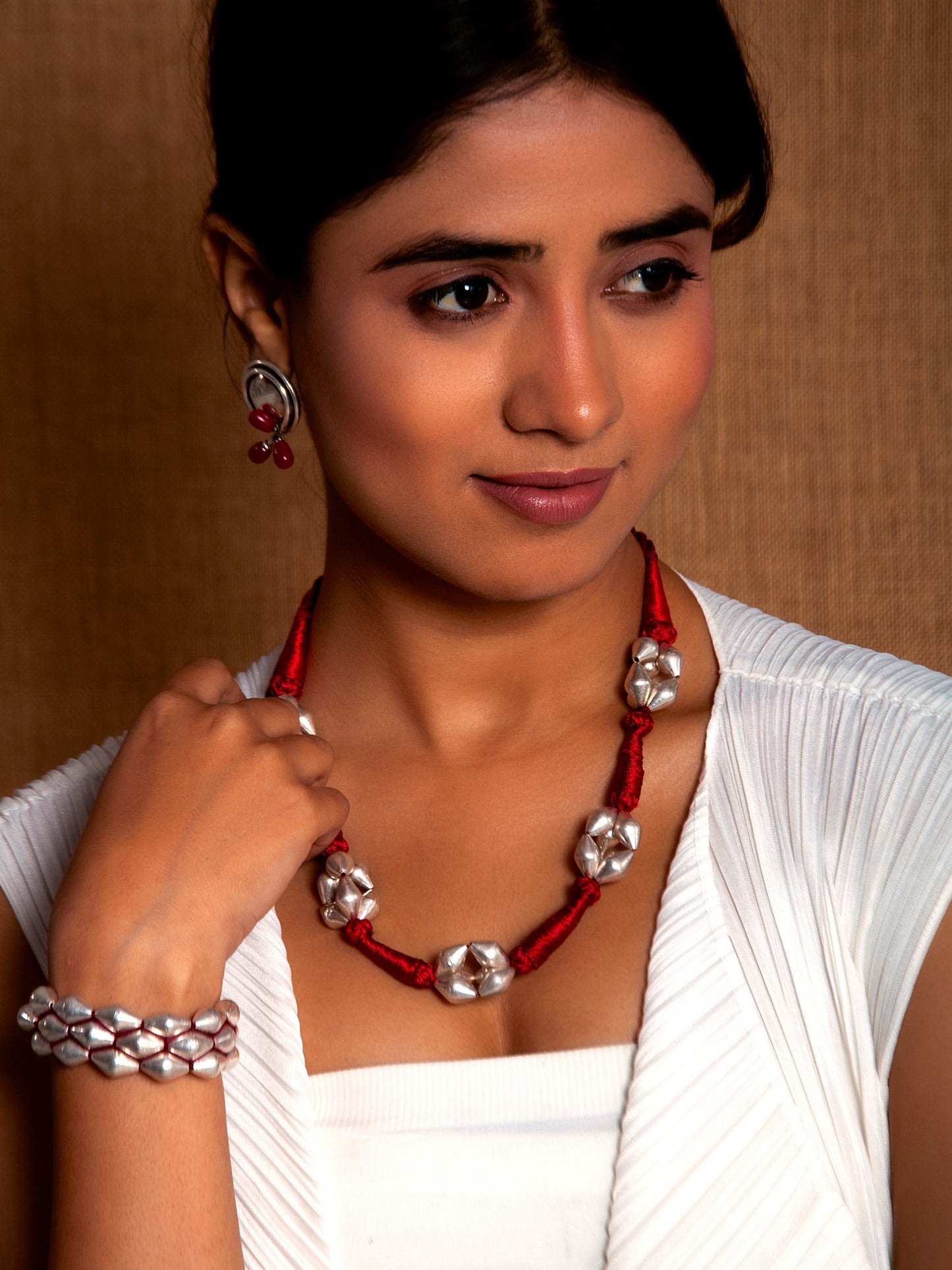 Dholki Bead Delight: 925 Silver Necklace with Red Silk Thread